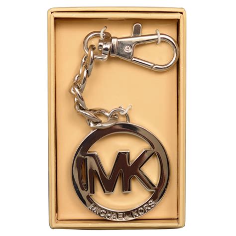 silver michael kors purse charm|Michael Kors charms for handbags.